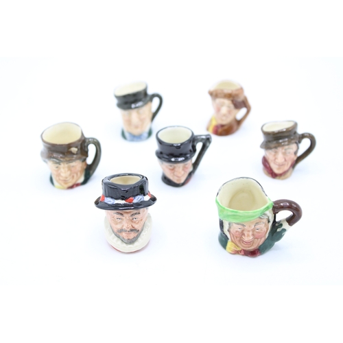 188 - Seen tiny Royal Doulton character jugs to include Arry, Sairey Gamp and others (7).