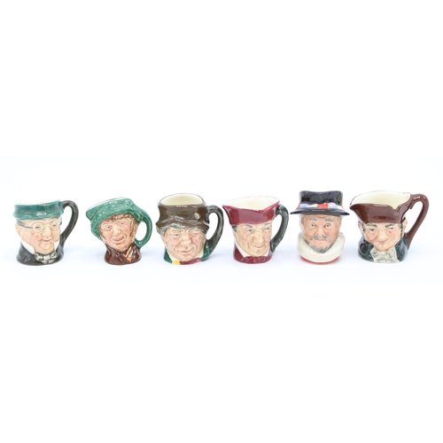 190 - Six Tiny Royal Doulton character jugs to include Beefeater, Old Charley and others (6).