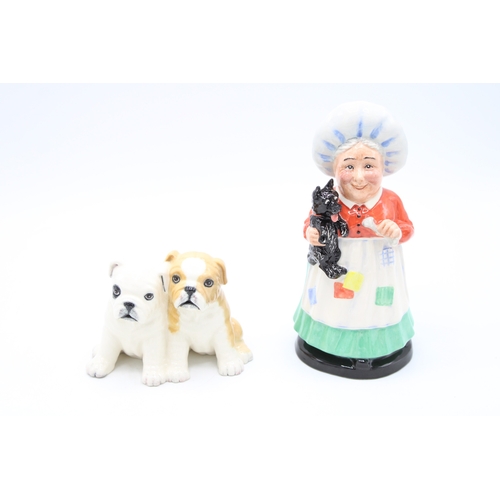 194 - Boxed Royal Doulton limited edition figures to include Old Mother Hubbard and Bulldog Pups DA248(2).