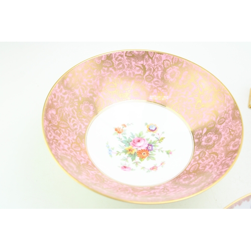 265 - Three Minton footed bowls together with a Wedgwood clock 'Sarah' pattern, (4).