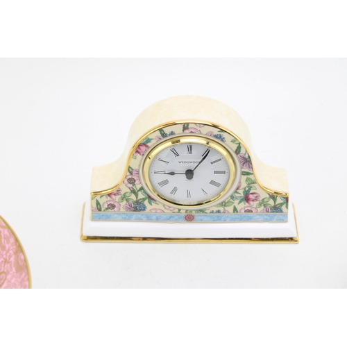 265 - Three Minton footed bowls together with a Wedgwood clock 'Sarah' pattern, (4).