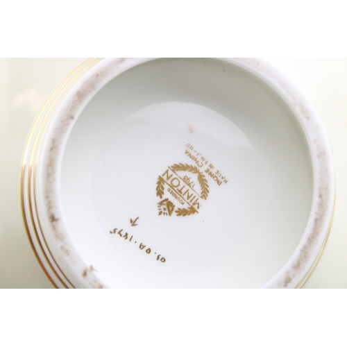 265 - Three Minton footed bowls together with a Wedgwood clock 'Sarah' pattern, (4).