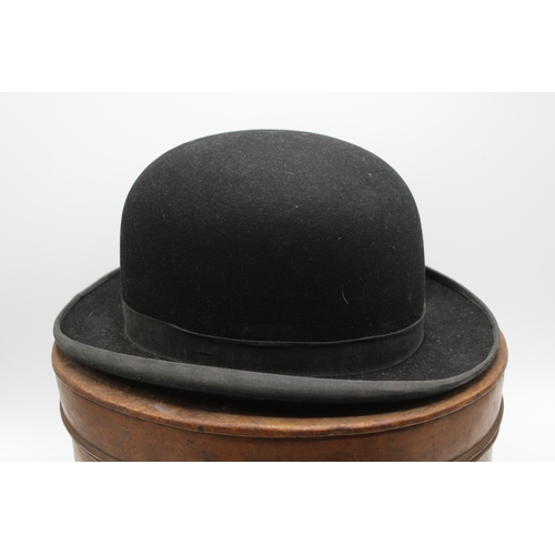 285 - A Battersby of London bowler hat, in metal hat box, opening 19.5cm x 15.5cm.