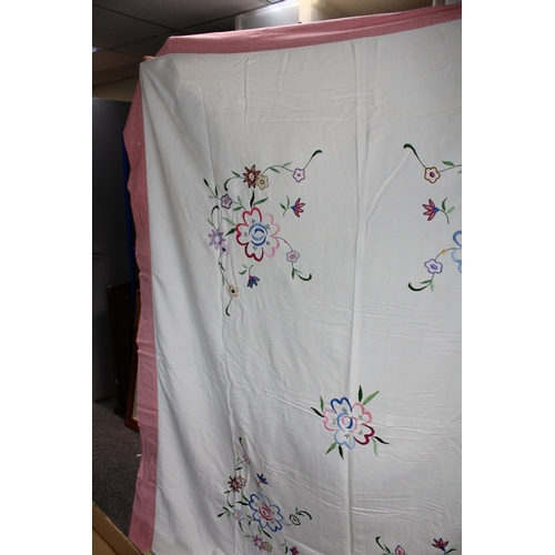 287 - Vintage bedspread, hand embroidered with floral design and pink border, 186cm x 224cm.