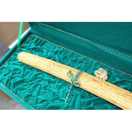 294 - Saudi Arabian Shamshir sword in presentation case, 100cm long.