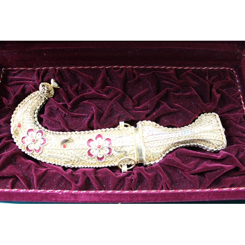 295 - Arabian Peninsular Jambiya ceremonial dagger in presentation case, 34cm long.