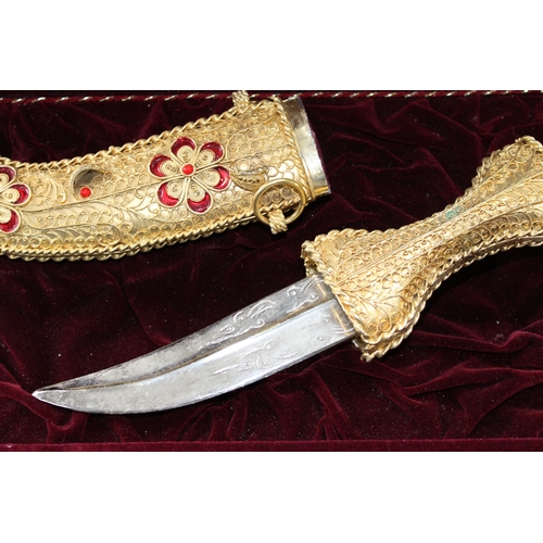 295 - Arabian Peninsular Jambiya ceremonial dagger in presentation case, 34cm long.
