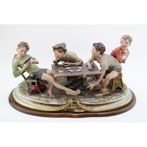 218 - Capodimonte porcelain figure group, modelled as 