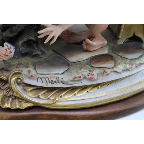 218 - Capodimonte porcelain figure group, modelled as 