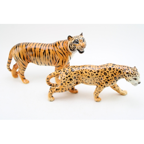 105 - Beswick Tiger 2096 together with Leopard 1082, 19cm tall, 31cm wide.