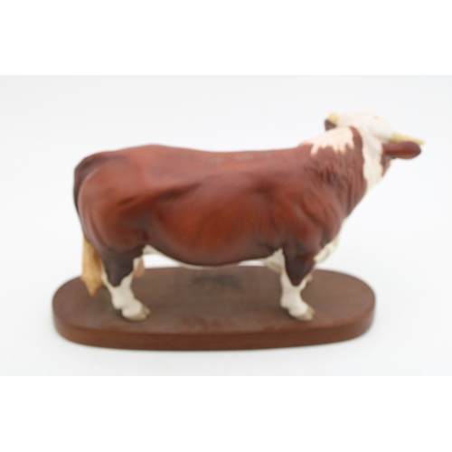 112 - Beswick Hereford Bull, Conneisseur Series, on wooden plinth.