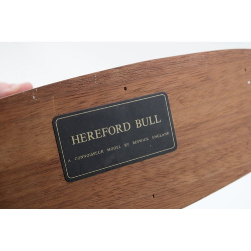112 - Beswick Hereford Bull, Conneisseur Series, on wooden plinth.