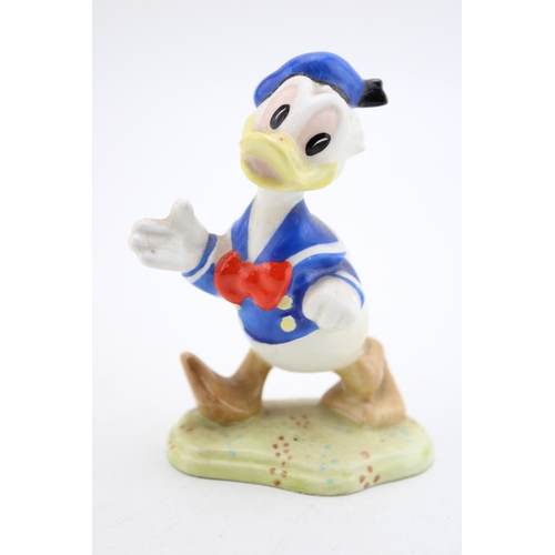 114 - Beswick The Walt Disney Series model Donald Duck, No 1283, gold printed marks.