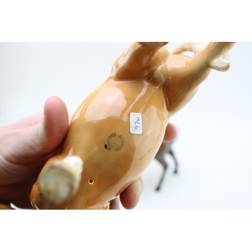 134 - Beswick Mare Facing Left 976, in three different colourways, to include a palomino, a brown and a gr... 