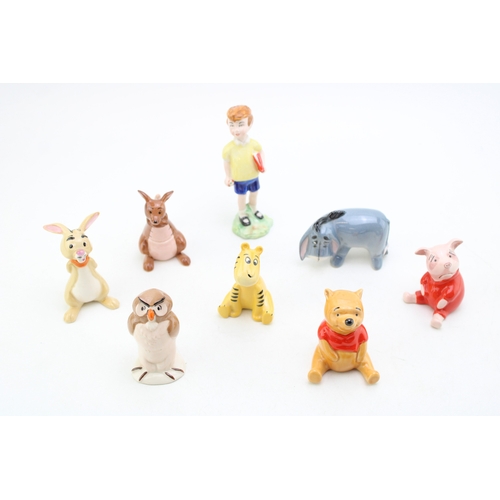 136 - Beswick Winnie the Pooh set to include Christopher Robin (8 - boxed).