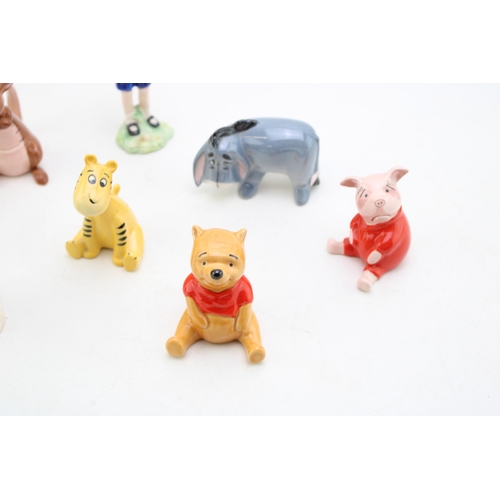 136 - Beswick Winnie the Pooh set to include Christopher Robin (8 - boxed).