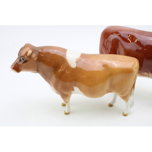 139 - Beswick to include an early Hereford Bull 949 with a Guernsey Bull (2).