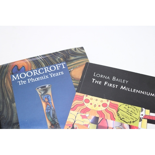 15 - A Lorna Bailey 'The First Millennium' reference book, with a Moorcroft hardback book 'The Phoenix Ye... 