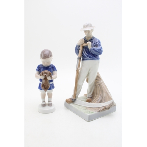 177 - A Royal Copenhagen figure of a farmer with scythe 685 with a B&G figure of a boy with a puppy (2).