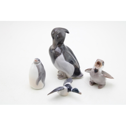 182 - Royal Copenhagen figures to include a standing duck 1941, a penguin 3003, a settling mallard and a B... 