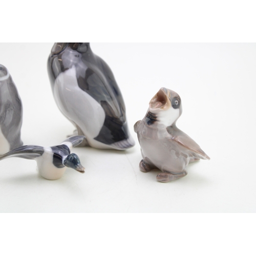 182 - Royal Copenhagen figures to include a standing duck 1941, a penguin 3003, a settling mallard and a B... 