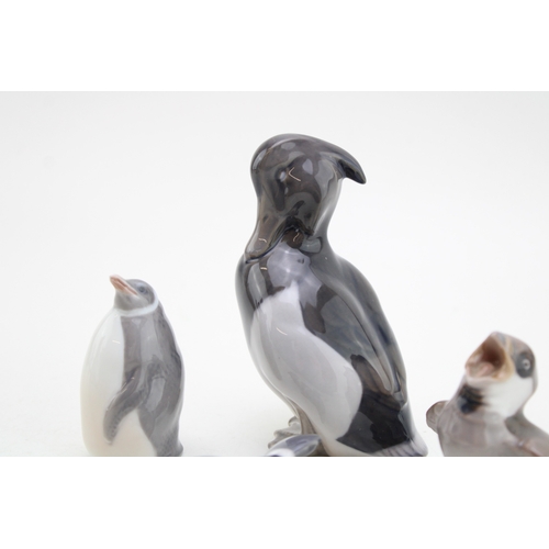 182 - Royal Copenhagen figures to include a standing duck 1941, a penguin 3003, a settling mallard and a B... 