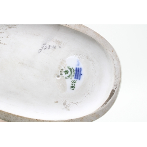 184 - Royal Copenhagen porcelain figure of a boy with two calves, 1858.