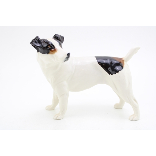 197 - Elite Pottery figure of a Jack Russell, 14cm long.
