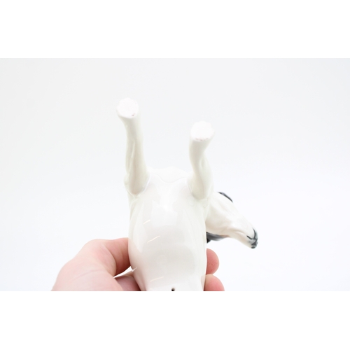 197 - Elite Pottery figure of a Jack Russell, 14cm long.