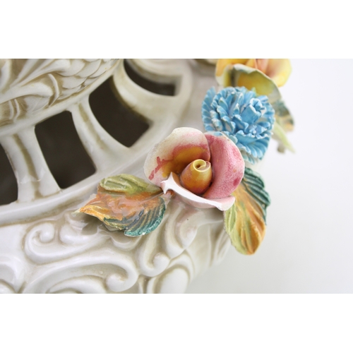 200 - Capodimonte lidded porcelain vase, hand-painted floral design, 24cm tall, 26cm wide.