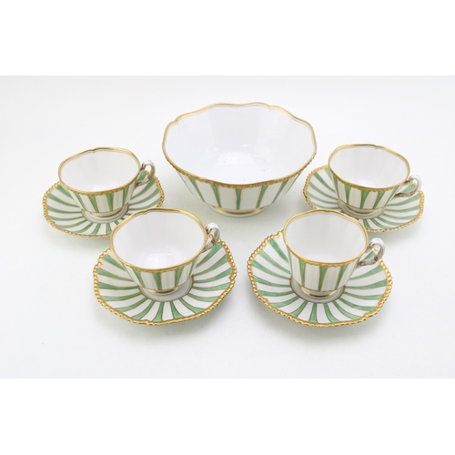 227 - A 19th century Flight Barr & Barr part tea service, decorated with green and gold striped decoration... 
