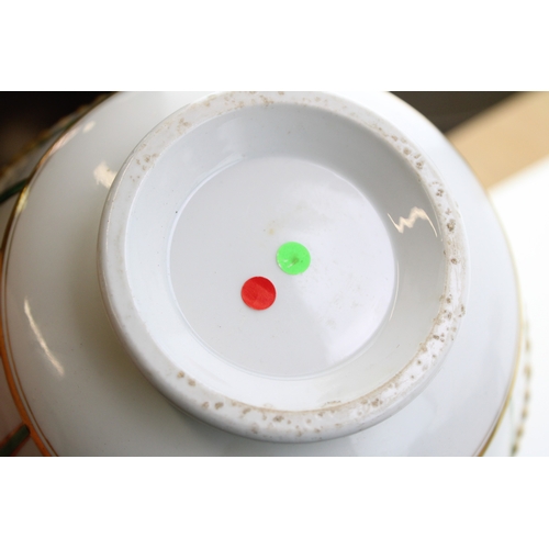 227 - A 19th century Flight Barr & Barr part tea service, decorated with green and gold striped decoration... 