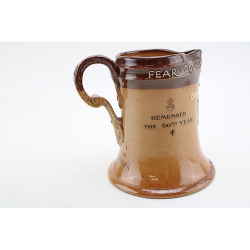 252 - Doulton Lambeth stoneware jug 'the gift of Lees Knowles MP', dated 1897, 17cm tall.