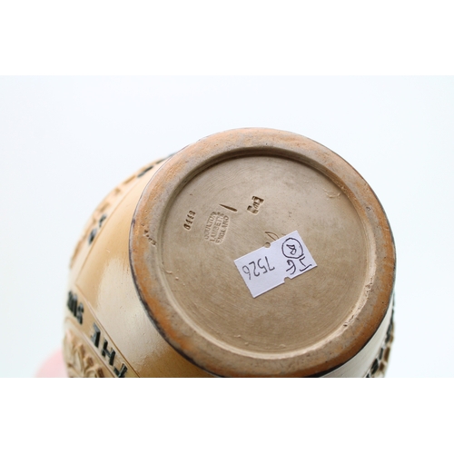 257 - Doulton Lambeth stoneware moto jug, 'For Every Ill Beneath the Sun...', 19cm tall.