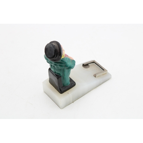 266 - Royal Doulton Tony Weller perpetual calendar with silver mount.