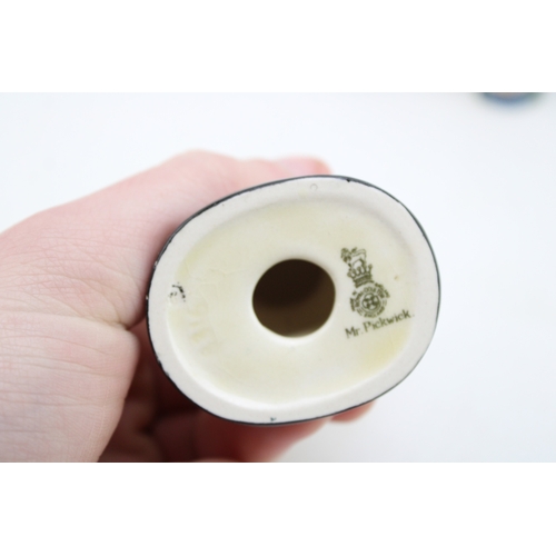 279 - Royal Doulton Dickens busts to include Micawber, Buzfuz, Pickwick and Sam Weller with tiny Micawber ... 