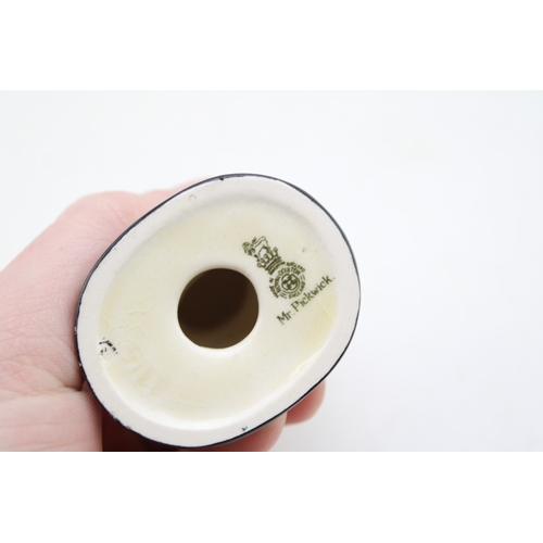 279 - Royal Doulton Dickens busts to include Micawber, Buzfuz, Pickwick and Sam Weller with tiny Micawber ... 