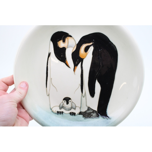 29 - Moorcroft limited edition plated decorated with a family of Emperor Penguins, 135/150, 26cm diameter... 