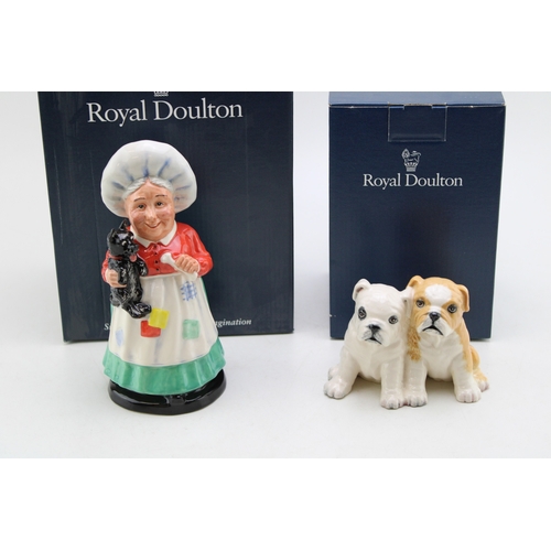 293 - Boxed Royal Doulton limited edition figures to include Old Mother Hubbard and Bulldog Pups DA248(2).