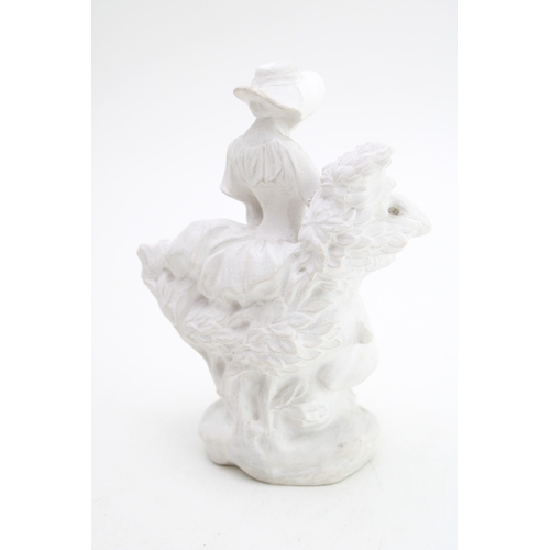 294 - A bisque pottery figure, probably Royal Doulton, impressed numbers to base, 14.5cm tall.