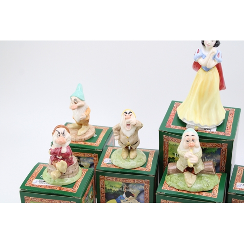 297 - Boxed Royal Doulton figures Snow White and the Seven Dwarfs (8).