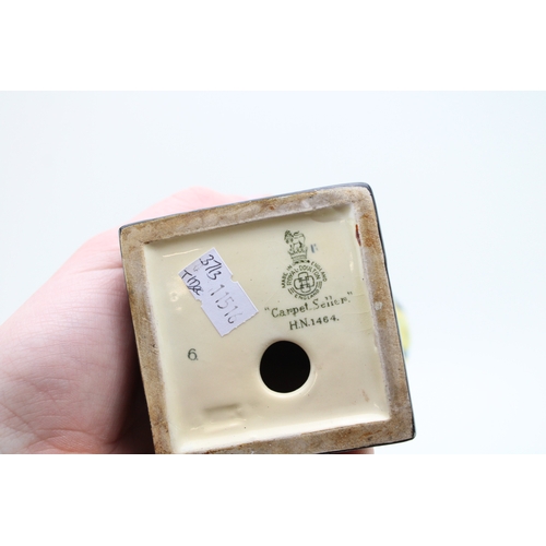 299 - Royal Doulton figures Carpet Seller HN1464, The Chief HN2892, Town Crier HN2119