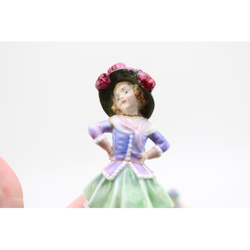 303 - Royal Doulton figures to include Two a Penny, Balloon Seller HN2130, Falstaff HN3236, Christmas Morn... 