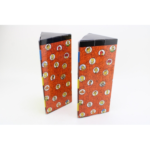 323 - Two boxed Coalport sets of The Simpsons stacking mugs (2 boxed sets of 4).