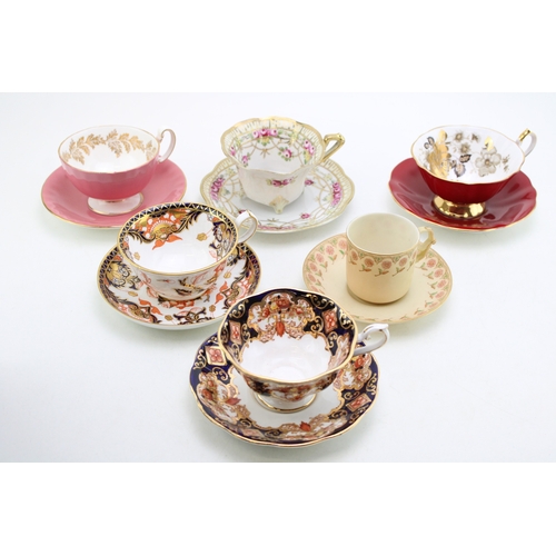 334 - A collection of six cups and saucers, all with floral designs, to include Royal Albert, Royal Crown ... 