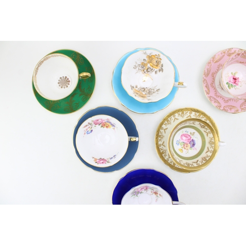 335 - A collection of cups and saucers to include Royal Albert, Royal Grafton and others (6).