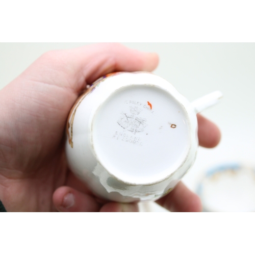 337 - A collection of Cabinet Cup and Saucer Duos - two Queen Victoria  Commemorative examples by Wileman ... 