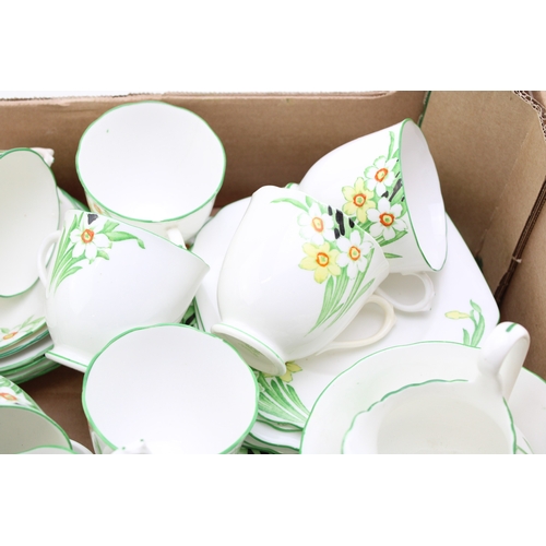 344 - A New Chelsea Staffs part tea service in the Sweet Nancy design to include eleven cups, saucers and ... 