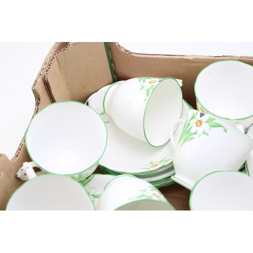 344 - A New Chelsea Staffs part tea service in the Sweet Nancy design to include eleven cups, saucers and ... 