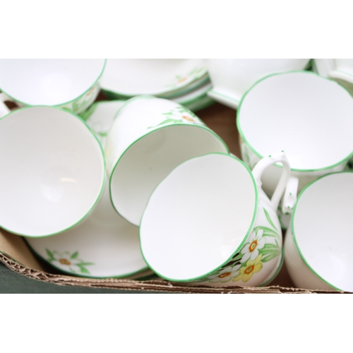 344 - A New Chelsea Staffs part tea service in the Sweet Nancy design to include eleven cups, saucers and ... 